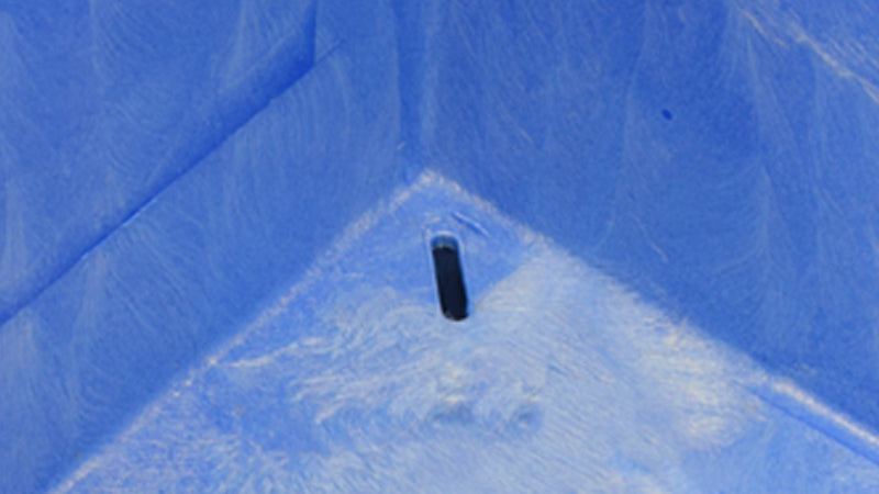 Blue bulk bin with drain hole