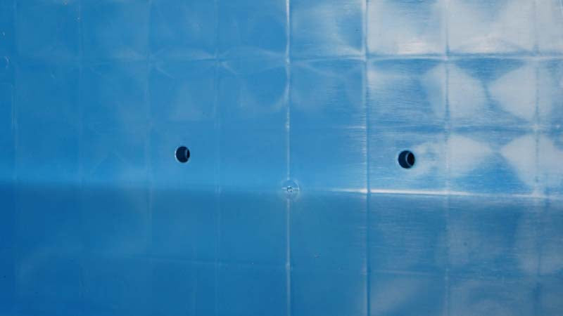 blue bin floor with drain holes